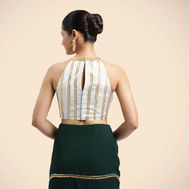 Zubeida x Tyohaar | Pearl White Halterneck FlexiFit™ Saree Blouse with Elegant Golden Gota Embellishment on Princess Line